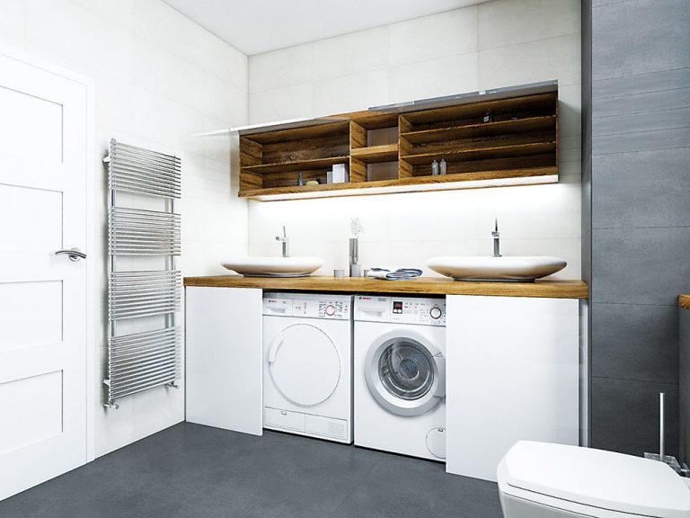 Práčka a sušička sú šikovne ukryté pod umývadlami za posuvnými dvierkami. Výška umývadla je preto v tomto prípade o niečo viac ako bežných 90 cm.