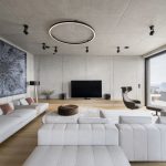 Veľká obývačka so sivou sedačkou a veľkým op-art dielom
