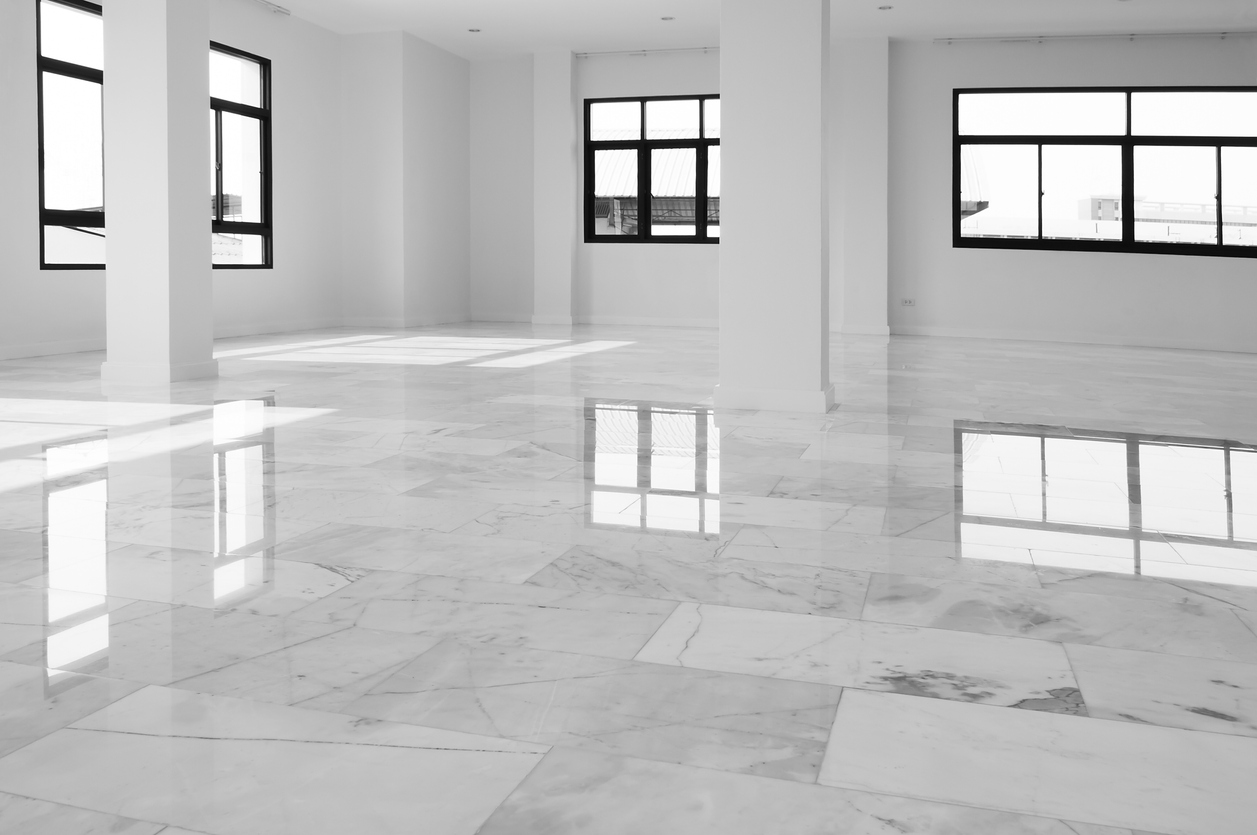 Interior of empty apartment,wide room with marble floor.White with grey marble floor interior background.White marble,quartz texture. Natural pattern or abstract background.