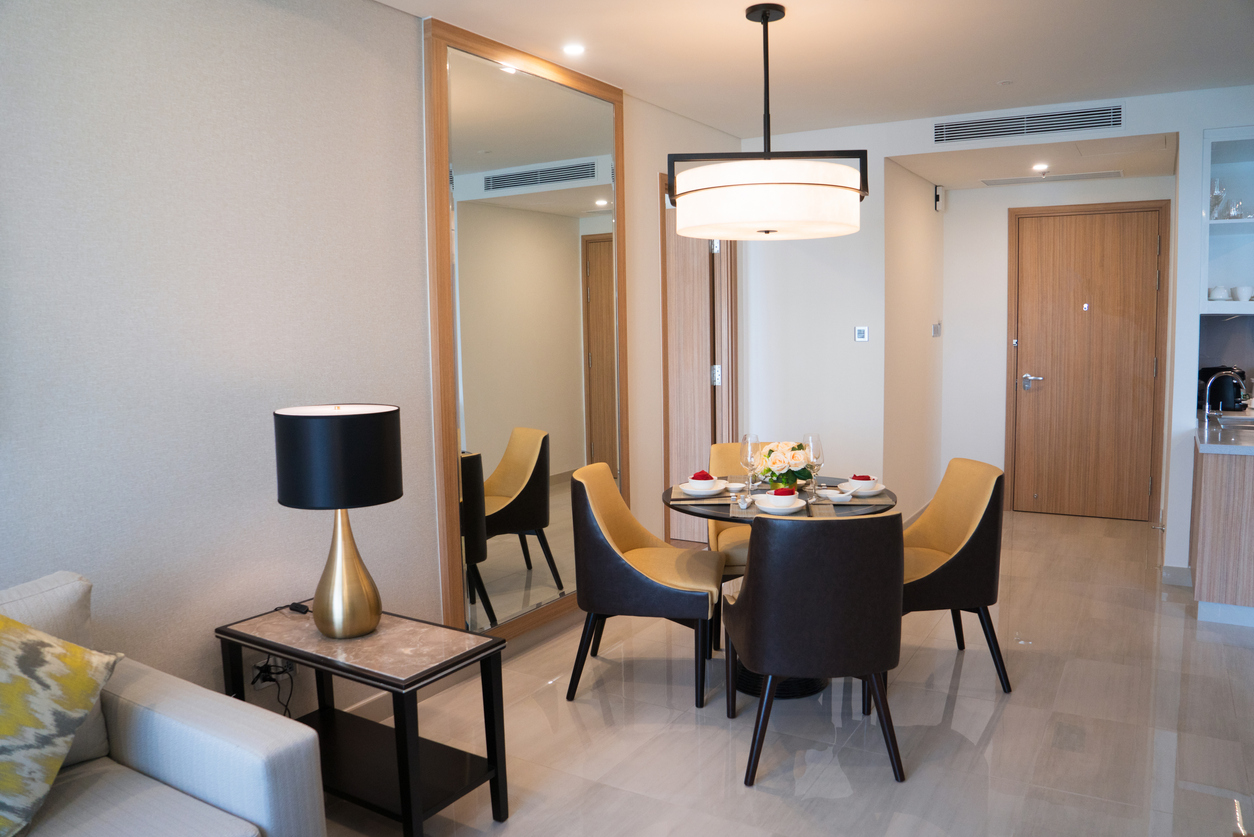Dining area of comfortable studio flat or hotel room