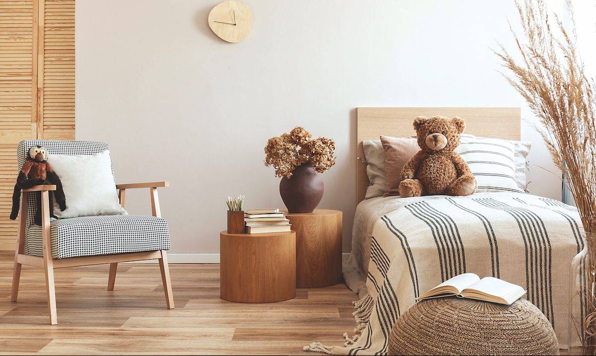 Flowers,In,Brown,Vase,On,Wooden,Nightstand,Table,Next,To