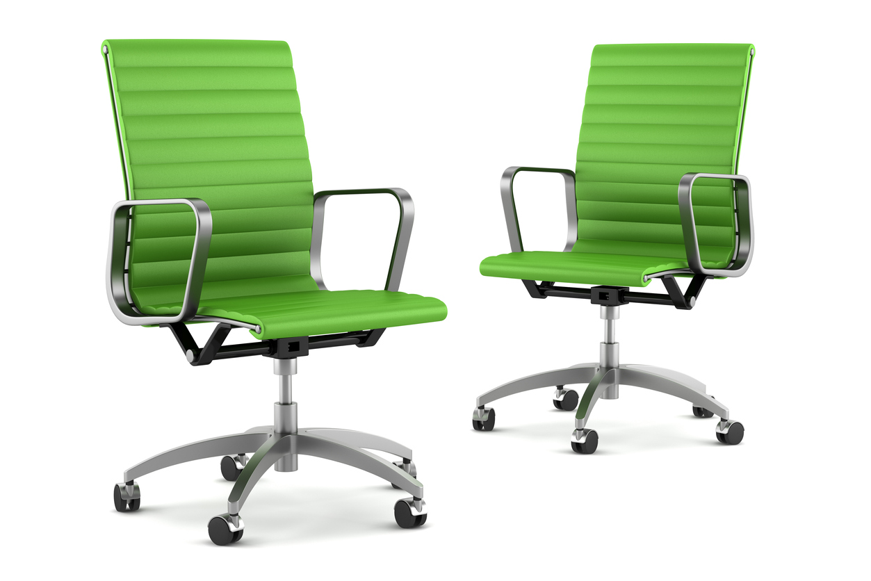 dve zelené kancelárske stoličky na kolieskach on white background