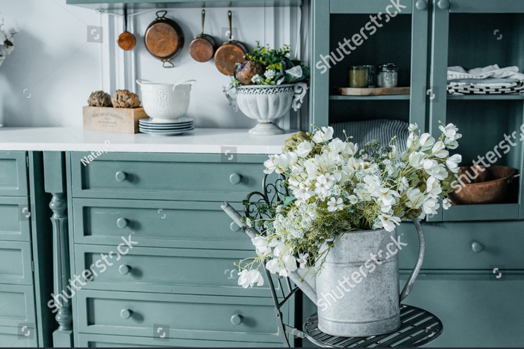Stock-photo-easter-spring-interior-decorations-in-green-light-kitchen-1951403695