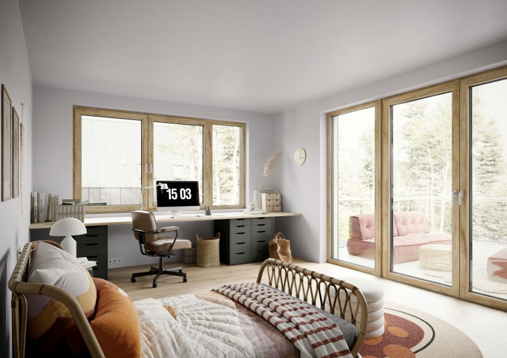 Interiér s posteľou, stolom, oknami a presklenými dverami na balkón.