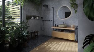 Kúpeľňa Ermes Wellness so sivým kamenným obkladom, drevenou podlahou a prírodnou atmosférou.