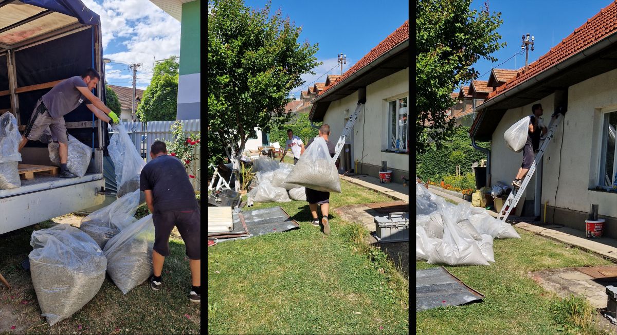 Práce na zateplení podlahy podkrovia - nanášanie 25 cm vrstvy tepelnoizolačného materiálu.