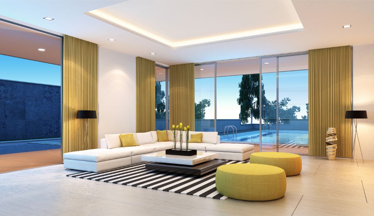 Hliníkové systémy AVG, ktoré prepájajú obývaciu čas a terasu.