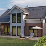 Moderný rodinný dom s tehlovou a bielou fasádou a terasou.