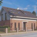 Moderný rodinný dom so sedlovou strechou a tehlovou fasádou.