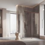 Sprchový kút s medeným rámom Oriana v modernej kúpeľni.