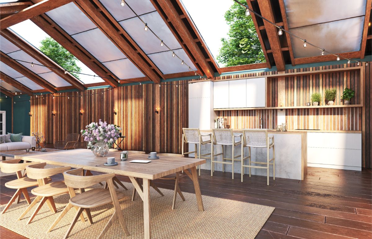 Terasa s vonkajšou kuchyňou a jedálenským stolom.