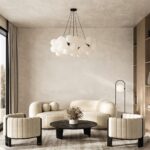 Svetlá miestnosť so zaobleným sedacém nábytkom a béžovou stierkou.