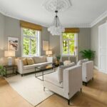 Oddychový kút so sedačkou a dvoma kreslami okolo subtílneho konferenčného stola